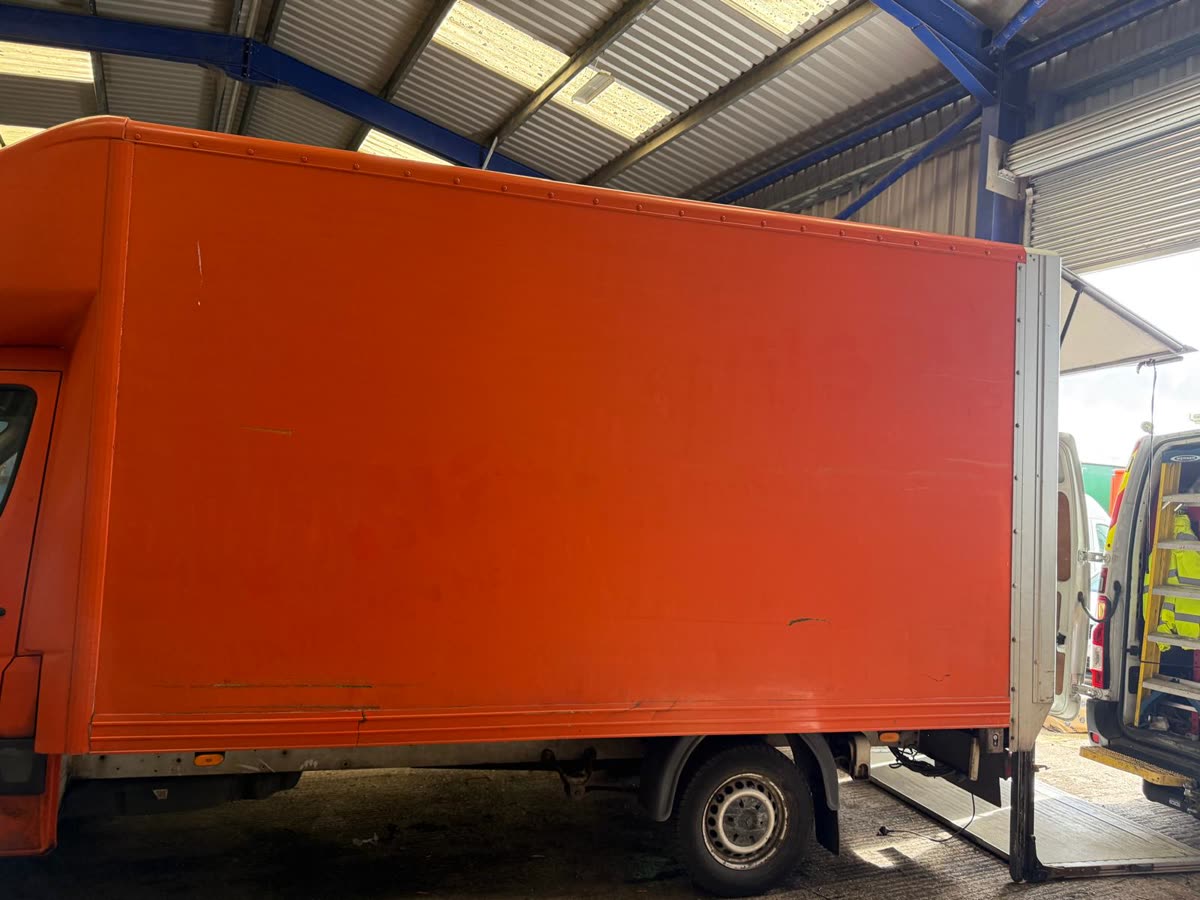 Box van side panel before barn doors